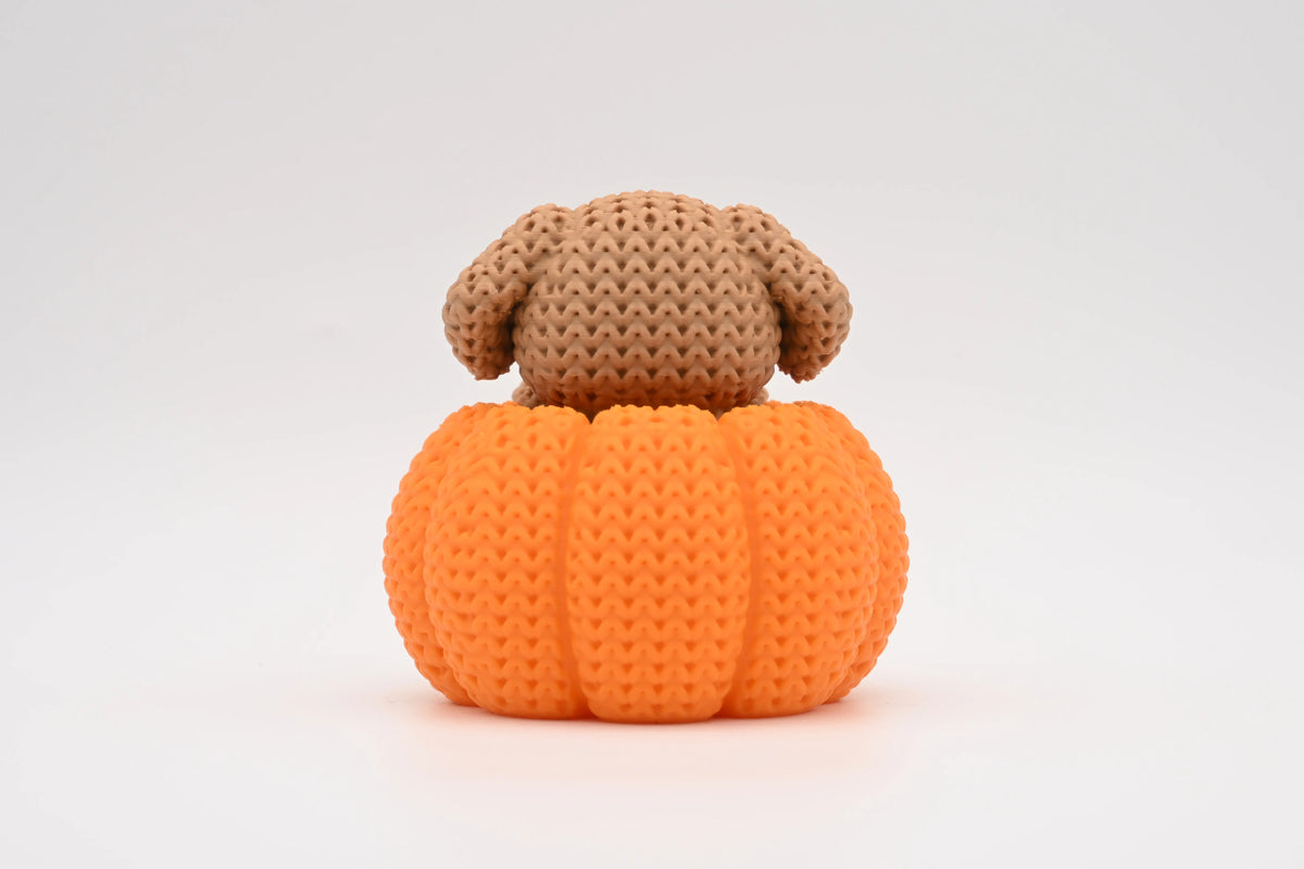 Dog in a Pumpkin Figurine
