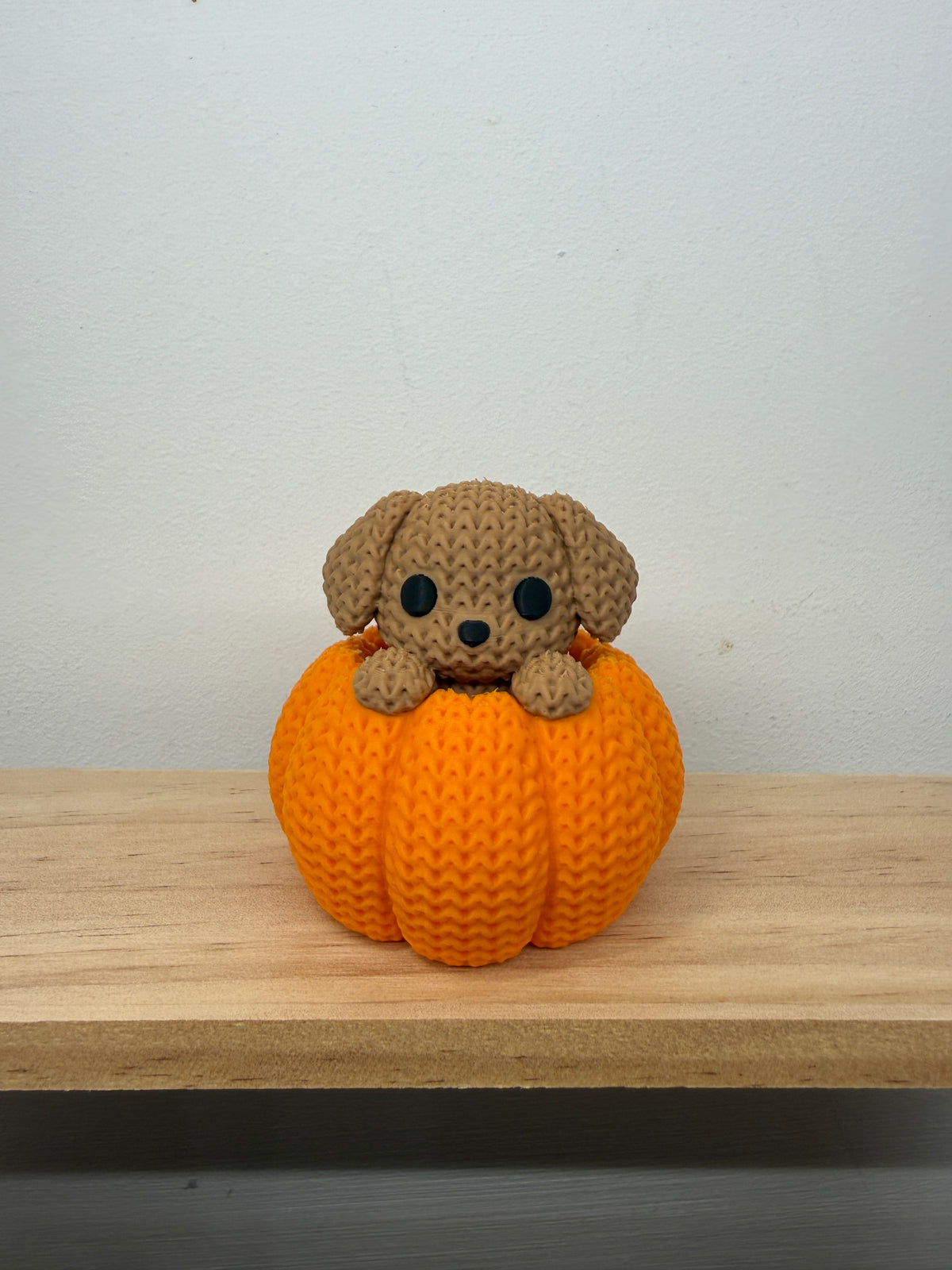 Dog in a Pumpkin Figurine