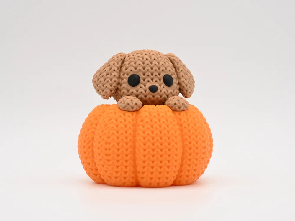 Dog in a Pumpkin Figurine